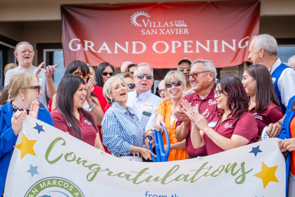 May be an image of 7 people and text that says 'VILLAS VILLASEL DEL SAN XAVIER GRAND OPENING 550료 HANNT Coo Ga ratulations trons N MARCOS Cong Congratulation'