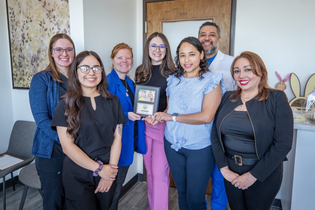 May be an image of 6 people, people smiling and text