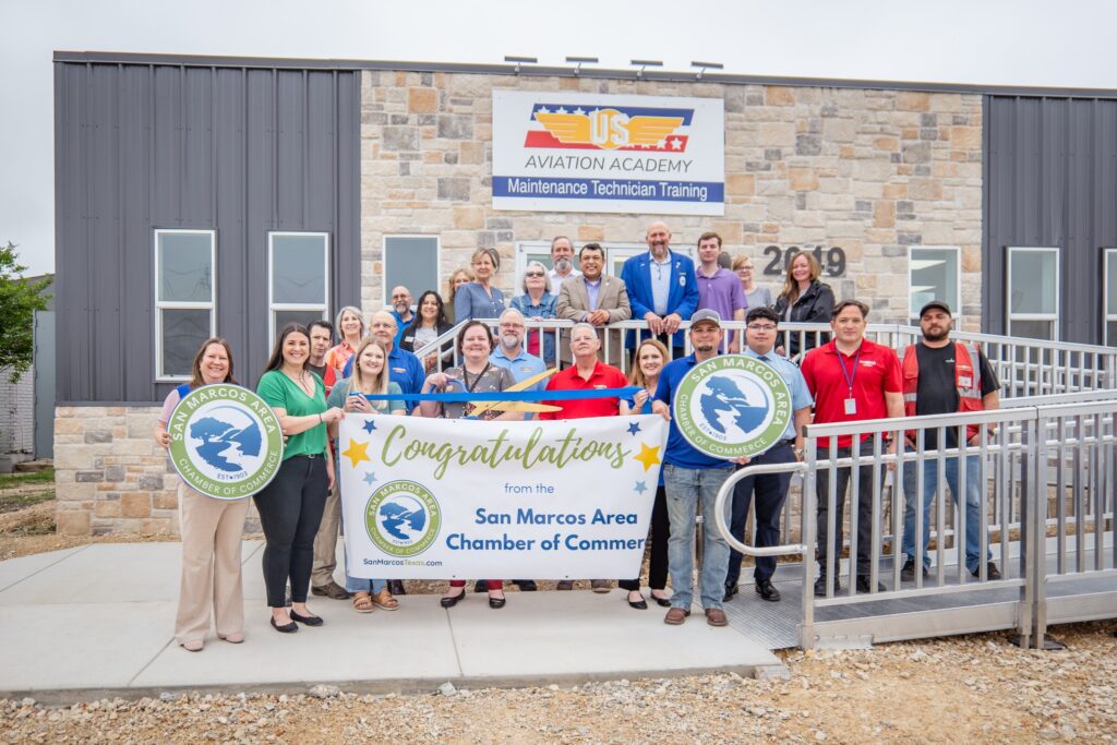 May be an image of 7 people and text that says 'USEG AVIATION AVIATIONACADEMY ACADEMY Maintenance Technician Training MARCOS AREA AI CHA ESTalecS COMM ERCE AMBE BER OF SAN ARE ဆေးသ COMMERC Congratulations ations from mthe the ¥ San Marcos Area Chamber of Commer Sa-Horeas asEam C'