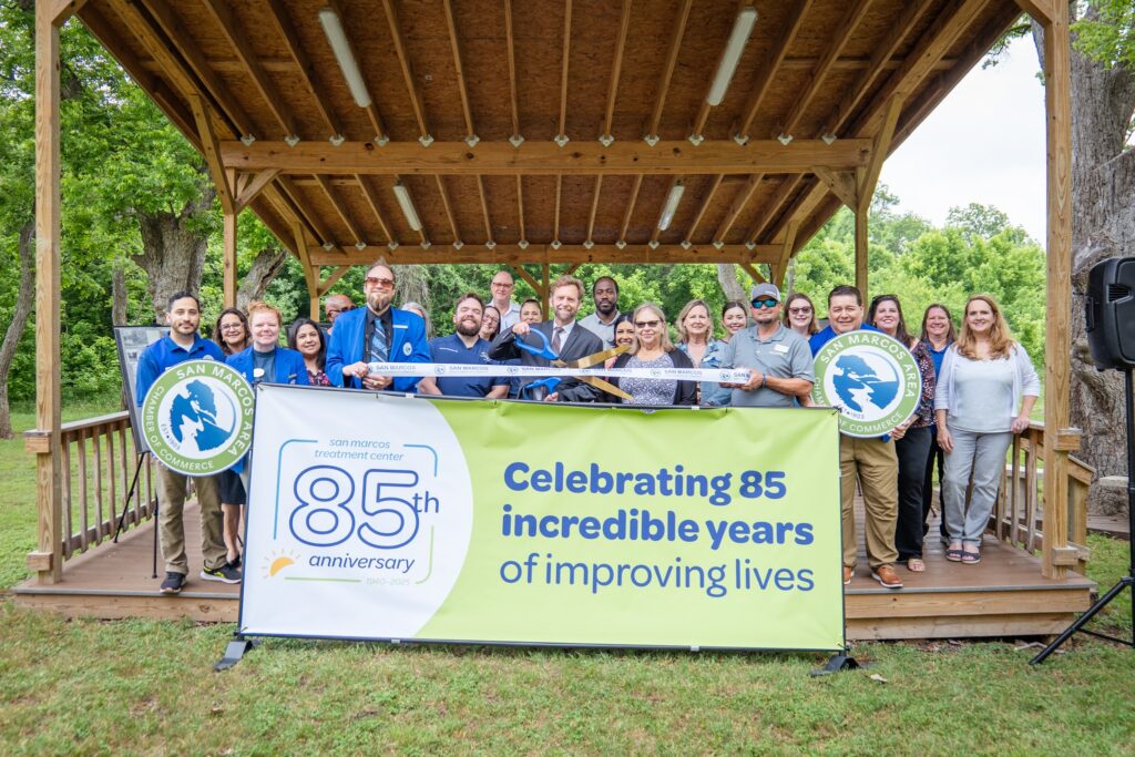 May be an image of 7 people and text that says 'SIA SALUIREAS SAN MARC ACAAAET 巴 d sanmarcos san COMMERCE 85h treatmentcenter treatn anniversary MARCOS AREA Rim Celebrating 85 incredible years of improving lives'